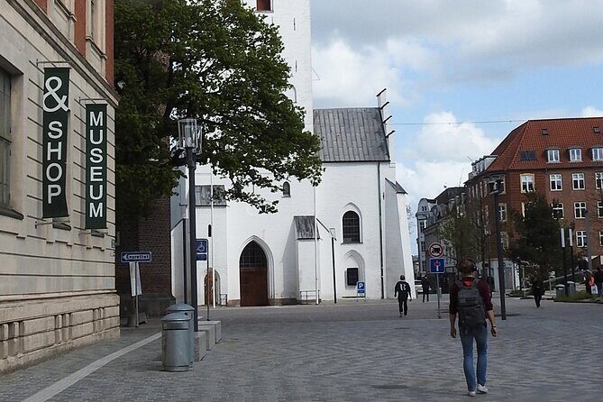Aalborg Historical Treasures: A Walking Tour - Stop 4: Jomfru Ane Gade, the long restaurant-and-pub street