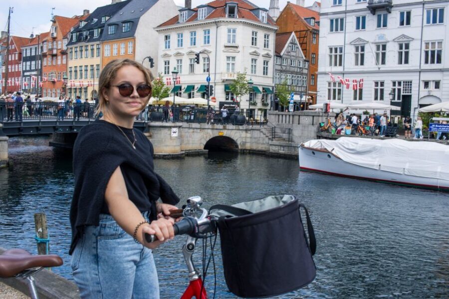 Copenhagen: Highlights 3 Hour Bike Tour with a Local Guide - Børsen to Nyhavn: From City Commerce to Waterfront Life