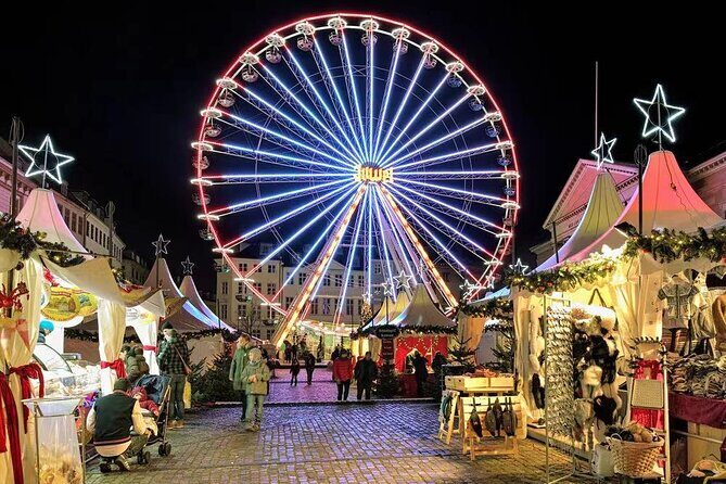 Copenhagen Private Christmas Walking Tour with Gløgg - Tivoli Gardens: spruce trees, roasted almonds, and the 1994 Christmas story