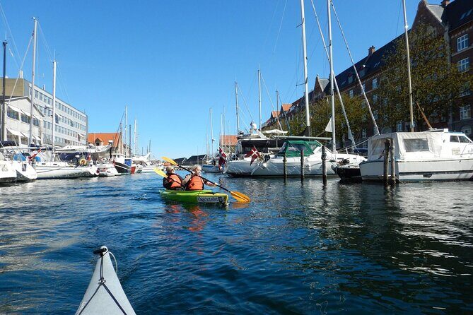 Kayak Tour in Copenhagen Harbor in May and September - Sliding Under Bridges and Moving Into the Canals