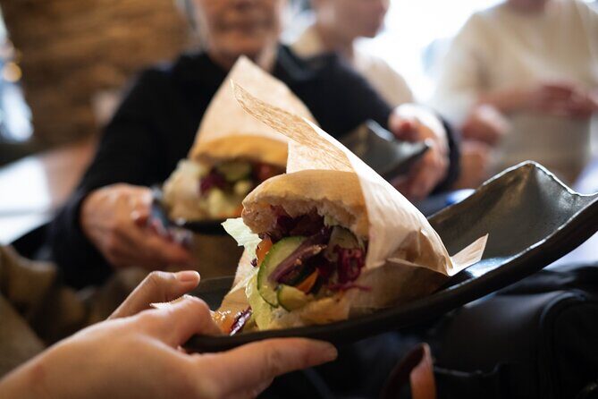Small Group Guided Food Tour and Street Art Visit to Norrebro - Stop 1 at Jagtvej 69: Ungdomshuset’s legacy meets a cheese bun